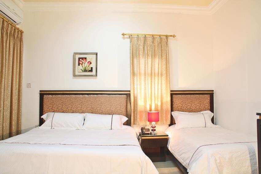 金玫瑰酒店 亚喀巴 客房 照片